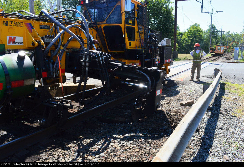 Close Up of Old RR tie Being Removed.  I am behind the guard rail seen here.  